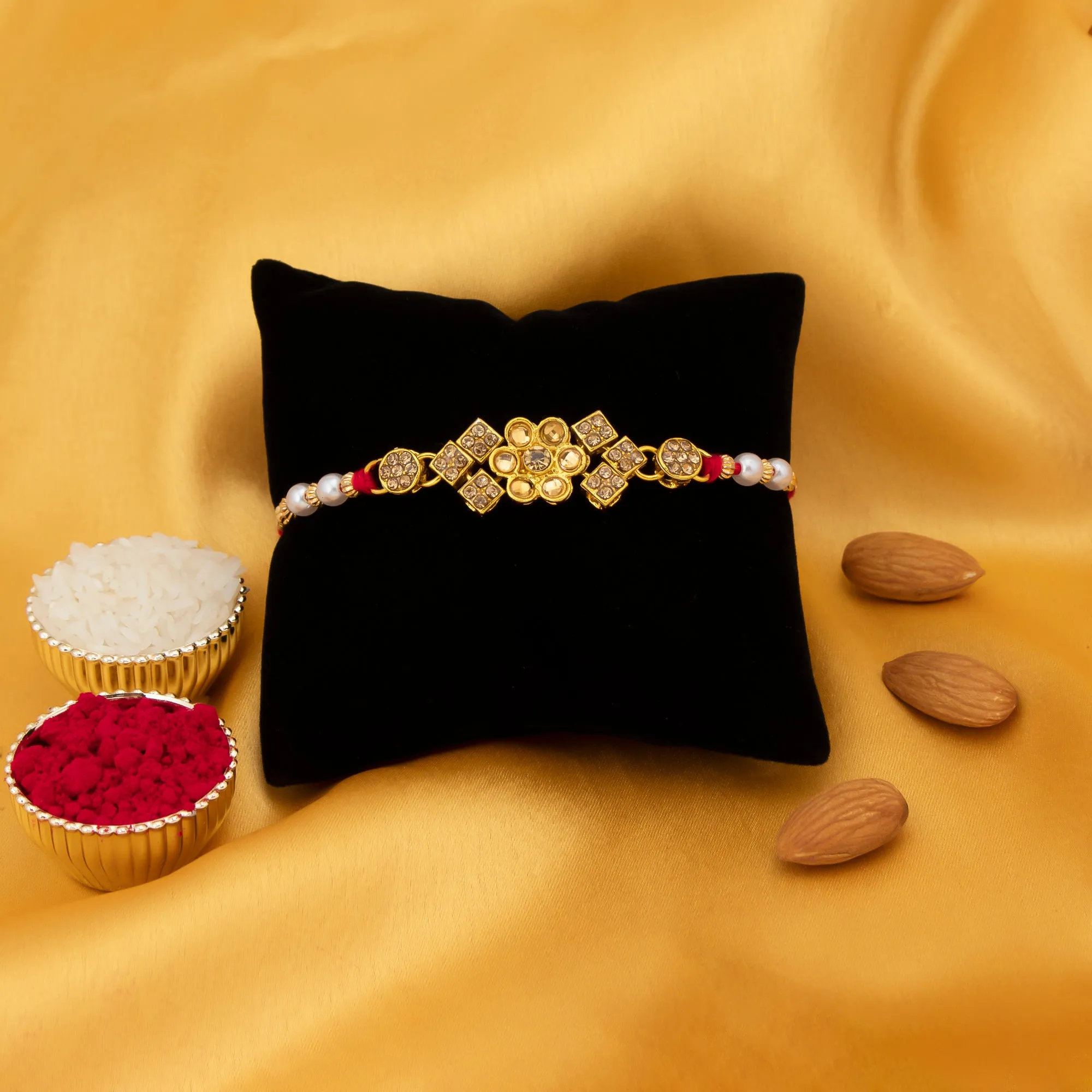 Sukkhi Blossomy Gold Plated Floral Rakhi with Roli Chawal and Raksha Bandhan Greeting Card For Men